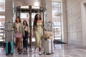 A group of women walking into the Alluvian Hotel.