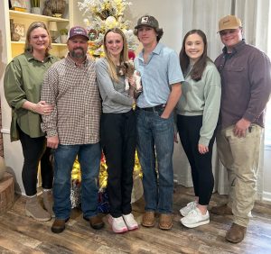 Group of people standing next to eachother